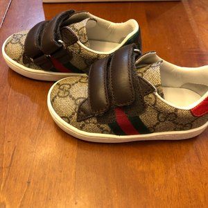 Two Pairs of Children's Gucci Shoes